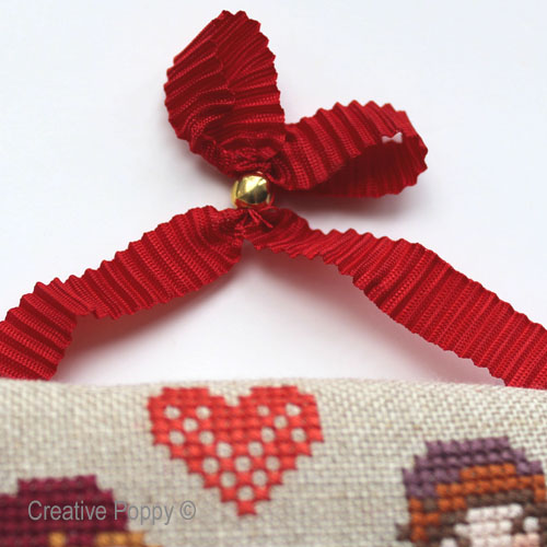 A pleated ribbon for hanging your cross stitch ornaments