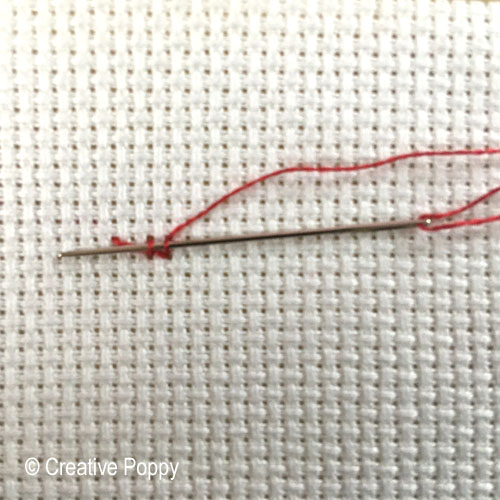 securing thread - isolated cross stitch (snowflake)