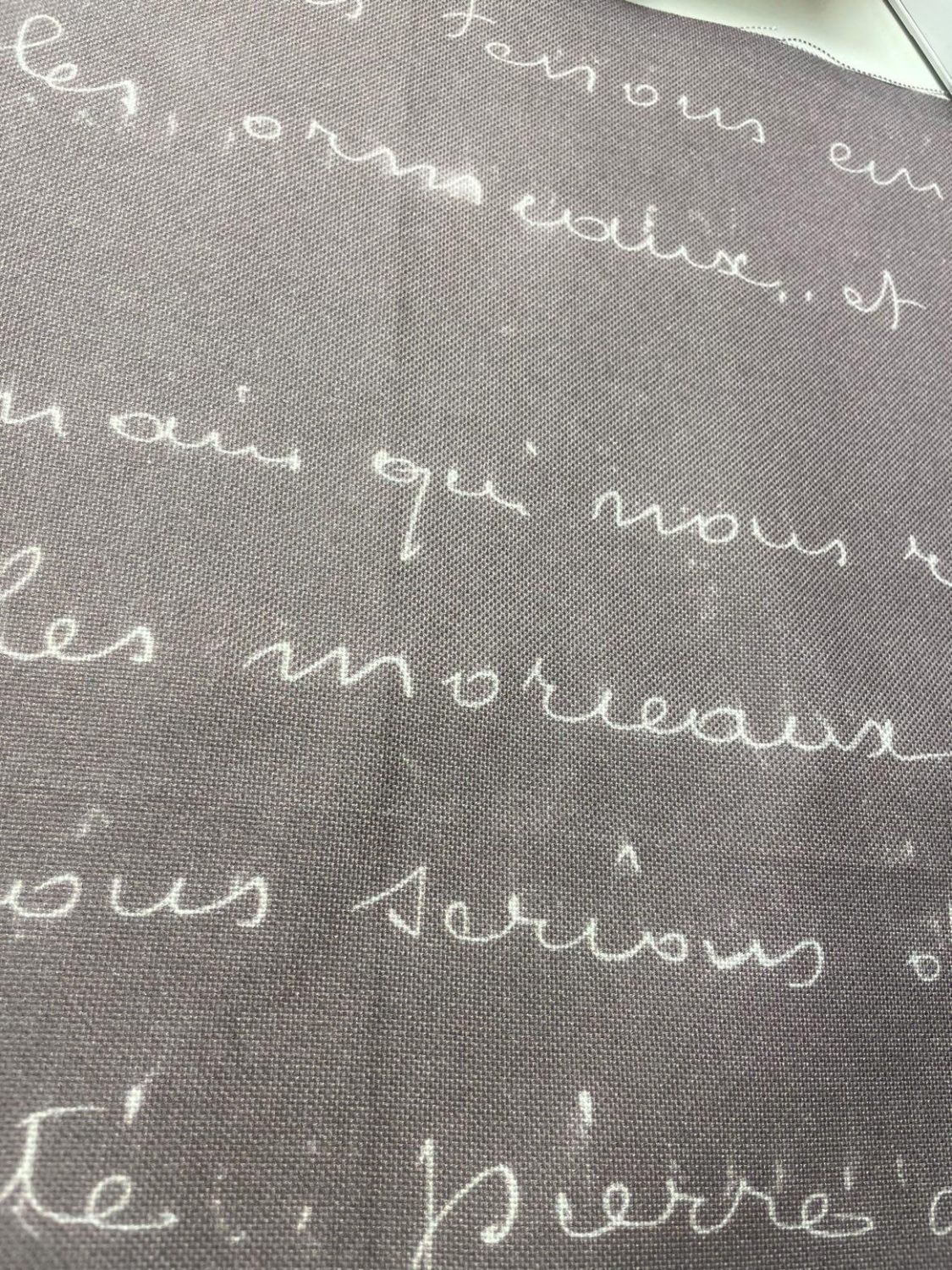 Fabric Flair 28ct evenweave Old French Script Dark (printed handwriting motif in white)