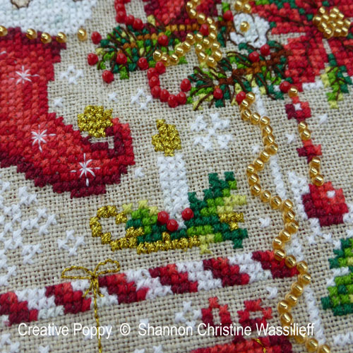 cross stitch pattern includes many fine details as well as golden thread highlights and beaded embellishments