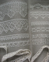 Photo shows examples of designs stitched on 14ct DMC Linen Aida in color 842