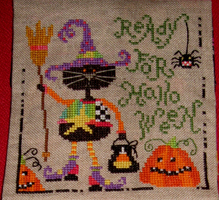 Rolande selected Barbara Ana's Halloween cat to stitch on the top part.