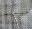 Use one strand and complete the stitch in two goes step1