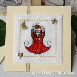 three different motifs to cross stitch for Christmas: an Angel, Santa and a Snowman (zoom 2)